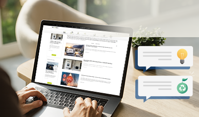Laptop computer displaying energy production/consumption graphs and an overview of the annual balance sheet, featuring Wattuneed software